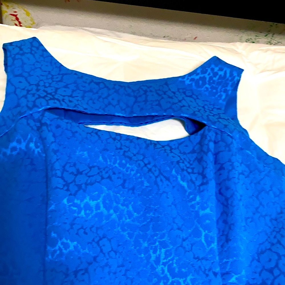 beautiful blue brocade fabric short dress, with cutout at neck and back